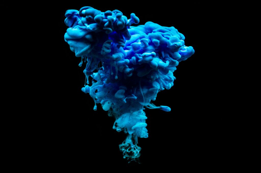 Blue abstract cloud in a sea of darkness